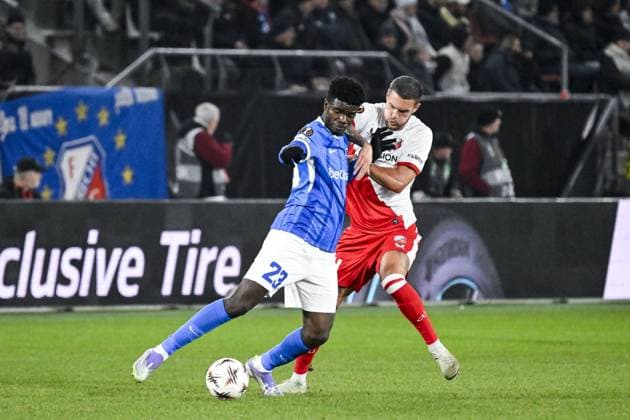 Genk s Bibout Banind and Utrecht s Mike Eerdhuijzen pictured in action during a soccer game between Dutch soccer club FC Utrecht and Belgian KRC Genk, on Thursday 22 January 2026 in Utrecht, Netherlands, the seventh game (out of 8) in the league phase of the UEFA Europa League competition. TOM GOYVAERTS TomxGoyvaerts  x157816891x
