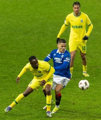 Max Aarons of Rangers in action with Bernard Tekpetey of Ludogorats during UEFA Europa League league phase match at Ibrox Stadium, Glasgow. Rangers v Ludogorats - UEFA Europa League - League Phase - Ibrox Stadium, Glasgow, Lanarkshire, Scotland, UK - 22 Jan 2026Glasgow Ibrox Stadium Lanarkshire, Scotland United Kingdom EDITORIAL USE ONLY  Copyright: xRangersxFC Shutterstockx 16394122w