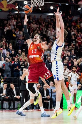 MUNICH, GERMANY - JANUARY 22: Andreas Andi Obst (FC Bayern Muenchen, 13) tries to score against Nathan Reuvers (Valencia Basket, 3) during the Turkish Airlines EuroLeague match between FC Bayern Muenchen vs. Valencia Basket at SAP Garden on round 24 of Turkish Airlines EuroLeague on January 22, 2026 in Munich, Germany. Bavaria Germany Copyright: xSteffiexWunderlx