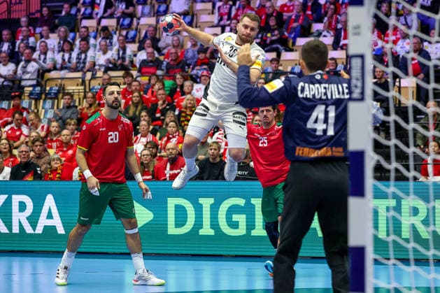 22 01 2026, Handball, Men s EHF EURO 2026, Germany Portugal, Jyske Bank Boxen in Herning, Denmark, Main Round Lukas Mertens Germany 36 throws on the goal of Gustavo Alexandre Cascao Capdeville Portugal 41 Denmark