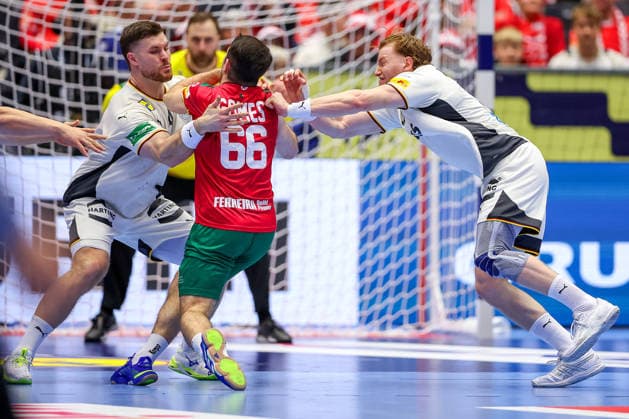 22 01 2026, Handball, Men s EHF EURO 2026, Germany Portugal, Jyske Bank Boxing in Herning, Denmark, Main Round Joao Pedro Vinhas Silva Gomes Portugal 66 in a duel against Johannes Golla Germany 04 Tom Kiesler Germany 30 Denmark
