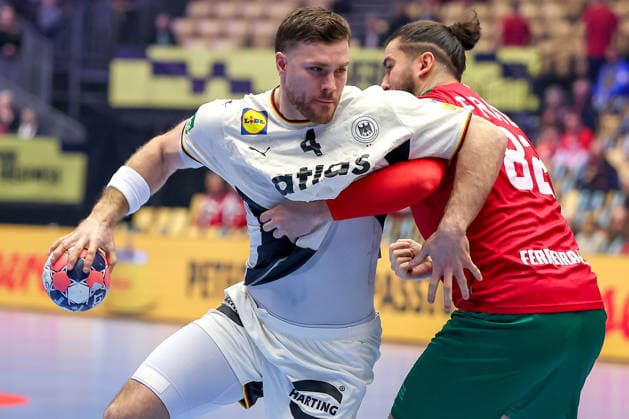 22 01 2026, Handball, Men s EHF EURO 2026, Germany Portugal, Jyske Bank Boxing in Herning, Denmark, Main Round Johannes Golla Germany 04 in duel against Luis Diogo Sousa Frade Portugal 82 Denmark