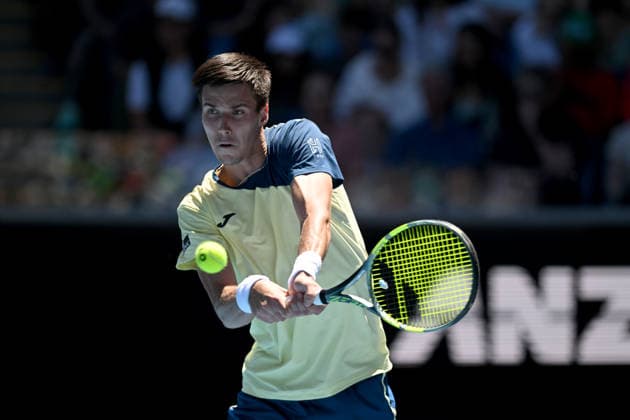 TENNIS AUSTRALIAN OPEN, Fabian Marozsan of Hungary in action during the Men™s 3rd round match against Daniil Medvedev of Russia on day 6 of the 2026 Australian Open tennis tournament at Melbourne Park in Melbourne, Friday, January 23, 2026. ( NO ARCHIVING MELBOURNE VICTORIA AUSTRALIA  Copyright: xLUKASxCOCHx 20260123157322547702