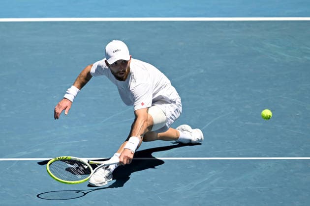 TENNIS AUSTRALIAN OPEN, Corentin Moutet of France in action during the Men™s 3rd round match against Carlos Alcaraz of Spain on day 6 of the 2026 Australian Open tennis tournament at Melbourne Park in Melbourne, Friday, January 23, 2026. ( NO ARCHIVING MELBOURNE VICTORIA AUSTRALIA  Copyright: xLUKASxCOCHx 20260123133699731395