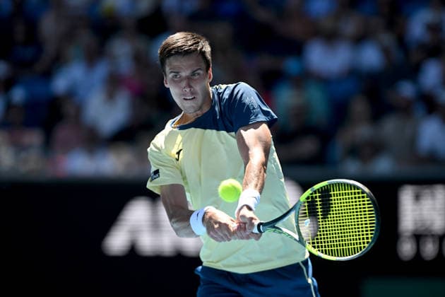 TENNIS AUSTRALIAN OPEN, Fabian Marozsan of Hungary in action during the Men™s 3rd round match against Daniil Medvedev of Russia on day 6 of the 2026 Australian Open tennis tournament at Melbourne Park in Melbourne, Friday, January 23, 2026. ( NO ARCHIVING MELBOURNE VICTORIA AUSTRALIA  Copyright: xLUKASxCOCHx 20260123148059986011
