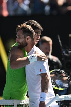 TENNIS AUSTRALIAN OPEN, Corentin Moutet of France congratulates Carlos Alcaraz of Spain on his win in their Men™s 3rd round match on day 6 of the 2026 Australian Open tennis tournament at Melbourne Park in Melbourne, Friday, January 23, 2026. ( NO ARCHIVING MELBOURNE VICTORIA AUSTRALIA  Copyright: xLUKASxCOCHx 20260123191843549874