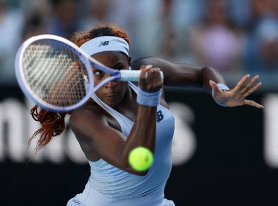 (260123) -- MELBOURNE, Jan. 23, 2026 -- Coco Gauff of the United States hits a return during the women s singles 3rd round match against Hailey Baptiste of the United States at the Australian Open tennis tournament in Melbourne, Australia, Jan. 23, 2026. ) (SP)AUSTRALIA-MELBOURNE-TENNIS-AUSTRALIAN OPEN-WOMEN S SINGLES MaxPing 