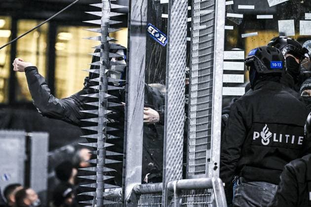 Picture shows an altercation between Dutch police and KRC Genk supporters ahead of a soccer game between Dutch soccer club FC Utrecht and Belgian KRC Genk, on Thursday 22 January 2026 in Utrecht, Netherlands, the seventh game (out of 8) in the league phase of the UEFA Europa League competition. TOM GOYVAERTS TomxGoyvaerts  x157954015x