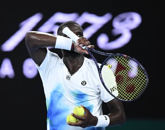 (260123) -- MELBOURNE, Jan. 23, 2026 -- Frances Tiafoe reacts during the men s singles 3rd round match between Alex de Minaur of Australia and Frances Tiafoe of the United States at the Australian Open tennis tournament in Melbourne, Australia, Jan. 23, 2026. (Photo by Xinhua) (SP)AUSTRALIA-MELBOURNE-TENNIS-AUSTRALIAN OPEN-MEN S SINGLES WangxShen 