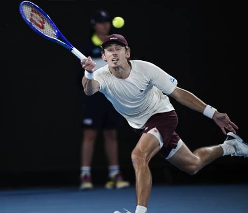(260123) -- MELBOURNE, Jan. 23, 2026 -- Alex de Minaur hits a return during the men s singles 3rd round match between Alex de Minaur of Australia and Frances Tiafoe of the United States at the Australian Open tennis tournament in Melbourne, Australia, Jan. 23, 2026. (Photo by Xinhua) (SP)AUSTRALIA-MELBOURNE-TENNIS-AUSTRALIAN OPEN-MEN S SINGLES WangxShen 