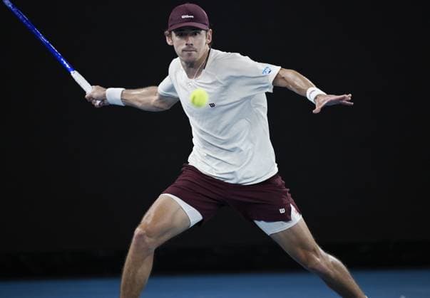(260123) -- MELBOURNE, Jan. 23, 2026 -- Alex de Minaur hits a return during the men s singles 3rd round match between Alex de Minaur of Australia and Frances Tiafoe of the United States at the Australian Open tennis tournament in Melbourne, Australia, Jan. 23, 2026. (Photo by Xinhua) (SP)AUSTRALIA-MELBOURNE-TENNIS-AUSTRALIAN OPEN-MEN S SINGLES WangxShen 