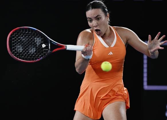 (260123) -- MELBOURNE, Jan. 23, 2026 -- Elena-Gabriela Ruse hits a return during the women s singles 3rd round match between Elena-Gabriela Ruse of Romania and Mirra Andreeva of Russia at the Australian Open tennis tournament in Melbourne, Australia, Jan. 23, 2026. (Photo by Xinhua) (SP)AUSTRALIA-MELBOURNE-TENNIS-AUSTRALIAN OPEN-WOMEN S SINGLES WangxShen 