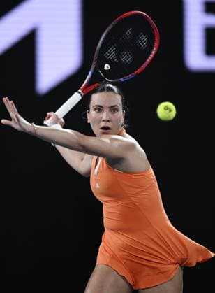 (260123) -- MELBOURNE, Jan. 23, 2026 -- Elena-Gabriela Ruse hits a return during the women s singles 3rd round match between Elena-Gabriela Ruse of Romania and Mirra Andreeva of Russia at the Australian Open tennis tournament in Melbourne, Australia, Jan. 23, 2026. (Photo by Xinhua) (SP)AUSTRALIA-MELBOURNE-TENNIS-AUSTRALIAN OPEN-WOMEN S SINGLES WangxShen 
