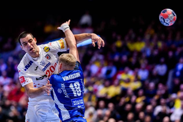 260123 Mateo Maras of Croatia and Ellidi Vidarsson of Iceland during the EHF European Handball Championship main round match between Iceland and Croatia on January 23, 2026 in Malmö Photo Petter Arvidson BILDBYRAN kod PA PA1134 handball handball handball handballs em 2026 croatia croatia island iceland ehf european handball championship bbeng grappa33  Copyright: PETTERxARVIDSON BB260123PA052