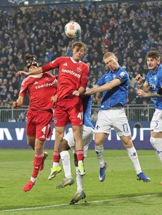 23 01 2026 Soccer Season 2025 2026 2 Soccer Bundesliga 19 Matchday SV Darmstadt 98 SVD D98 Lilien 1 FC Nürnberg FCN Club Sportfoto Zink DaMa xdaxmax DFL regulations prohibit any use of photographs as image sequences and or quasi video only for editorial use Eric Porstner 41, 1 FC Nürnberg FCN in header duel with Kai Klefisch 17, SV Darmstadt 98 D98 SV98