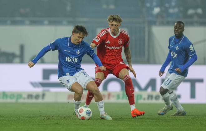 GER, Darmstadt, SV Darmstadt 98 vs 1 FC Nürnberg, 2 Bundesliga, Football, DFB, Season 2025 2026, Merck Stadion am Böllenfalltor, 19 Matchday in the picture from l Luca Marseiler SV Darmstadt 98 8 , Tim Drexler 1 FC Nürnberg 15 DFB DFL REGULATIONS PROHIBIT ANY USE OF PHOTOGRAPHS AS IMAGE SEQUENCES AND OR QUASI VIDEO, 23 01 2026 Copyright: HMBxMedia HendrikxHamelau