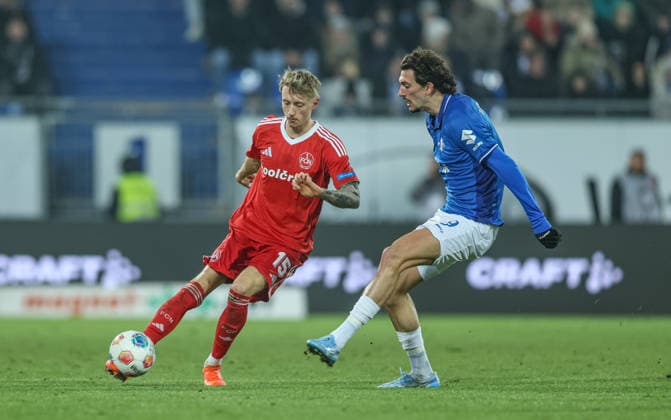 GER, Darmstadt, SV Darmstadt 98 vs 1 FC Nürnberg, 2 Bundesliga, Football, DFB, Season 2025 2026, Merck Stadion am Böllenfalltor, 19 Matchday in picture f l Tim Drexler 1 FC Nürnberg 15 , Fraser Hornby SV Darmstadt 98 9 DFB DFL REGULATIONS PROHIBIT ANY USE OF PHOTOGRAPHS AS IMAGE SEQUENCES AND OR QUASI VIDEO, 23 01 2026 Copyright: HMBxMedia HendrikxHamelau