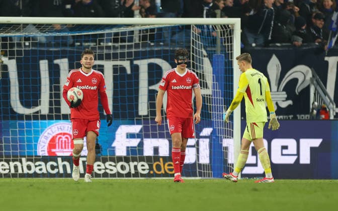 23 01 2026, Soccer 2 Bundesliga, SV Darmstadt 98 1 FC Nürnberg, emonline, emspor, despor, v l , Adam Markhiev 1 FC Nürnberg , Fabio Gruber 1 FC Nürnberg , Goalkeeper Jan Reichert 1 FC Nürnberg enttaeuscht, looking disappointed, dissapointed, sad, frustrated, frustrated, frustrated DFL DFB REGULATIONS PROHIBIT ANY USE OF PHOTOGRAPHS AS IMAGE SEQUENCES AND OR QUASI VIDEO xdcx Copyright: HMBxMedia Claus
