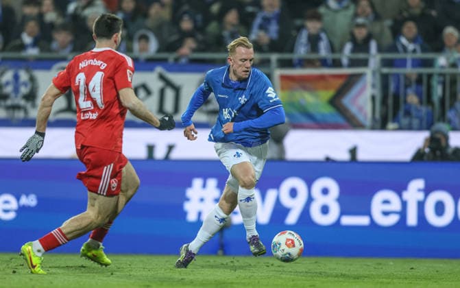 GER, Darmstadt, SV Darmstadt 98 vs 1 FC Nürnberg, 2 Bundesliga, Football, DFB, Season 2025 2026, Merck Stadion am Böllenfalltor, 19 Matchday in picture f l Luka Lochoshvili 1 FC Nürnberg 24 , Isac Lidberg SV Darmstadt 98 7 DFB DFL REGULATIONS PROHIBIT ANY USE OF PHOTOGRAPHS AS IMAGE SEQUENCES AND OR QUASI VIDEO, 23 01 2026 Copyright: HMBxMedia HendrikxHamelau
