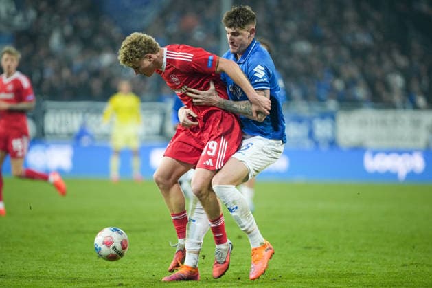 Soccer 2 Bundesliga, Matchday 19, SV Darmstadt 98 1 FC Nürnberg on 23 01 2026 in Darmstadt Merck Stadion am Böllenfalltor , Germany, Season 2025 2026 DFB DFL REGULATIONS PROHIBIT ANY USE OF PHOTOGRAPHS as IMAGE SEQUENCES and or QUASI VIDEO Piet Scobel 39, FCN in duel with Matej Maglica 5, SVD Darmstadt Merck Stadion am Böllenfalltor Germany Copyright: xChristophxKinzingerx