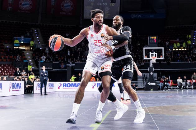 MUNICH, GERMANY - JANUARY 23: Dan Oturu (Hapoel IBI Tel Aviv, 25) controls the ball against Bruno Fernando (Partizan Mozzart Bet Belgrade, 24) during the Turkish Airlines EuroLeague match between Partizan Mozzart Bet Belgrade vs. Hapoel IBI Tel Aviv at BMW Park on round 24 of Turkish Airlines EuroLeague on January 23, 2026 in Munich, Germany. Bavaria Germany Copyright: xSteffiexWunderlx