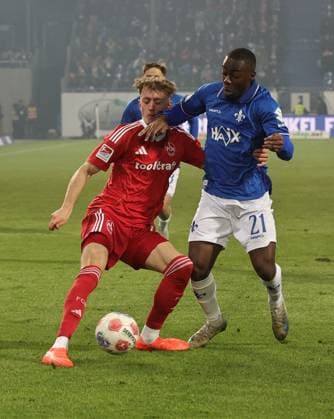 23 01 2026 Soccer Season 2025 2026 2 Soccer Bundesliga 19 Matchday SV Darmstadt 98 SVD D98 Lilien 1 FC Nürnberg FCN Club Sportfoto Zink DaMa xdaxmax DFL regulations prohibit any use of photographs as image sequences and or quasi video only for editorial use Tim Drexler 15, 1 FC Nürnberg FCN Matondo Merveille Papela 21, SV Darmstadt 98 D98 SV98
