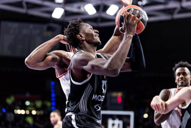 MUNICH, GERMANY - JANUARY 23: Isaac Bonga (Partizan Mozzart Bet Belgrade, 17) controls the ball against Dan Oturu (Hapoel IBI Tel Aviv, 25) during the Turkish Airlines EuroLeague match between Partizan Mozzart Bet Belgrade vs. Hapoel IBI Tel Aviv at BMW Park on round 24 of Turkish Airlines EuroLeague on January 23, 2026 in Munich, Germany. Bavaria Germany Copyright: xSteffiexWunderlx