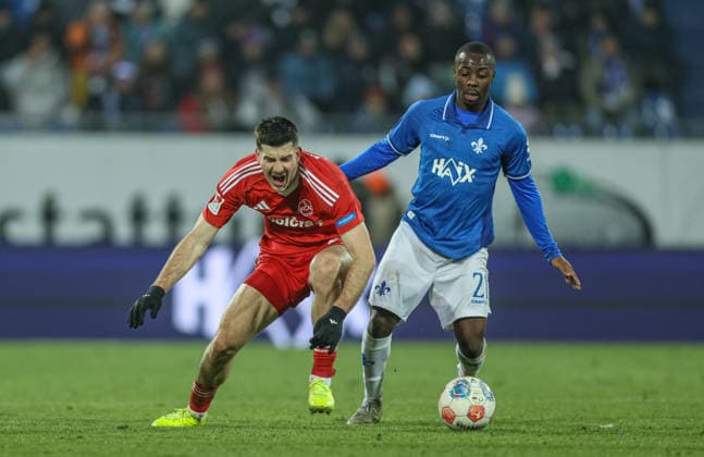 GER, Darmstadt, SV Darmstadt 98 vs 1 FC Nürnberg, 2 Bundesliga, Football, DFB, Season 2025 2026, Merck Stadion am Böllenfalltor, 19 Matchday in picture f l Luka Lochoshvili 1 FC Nürnberg 24 , Merveille Papela SV Darmstadt 98 21 DFB DFL REGULATIONS PROHIBIT ANY USE OF PHOTOGRAPHS AS IMAGE SEQUENCES AND OR QUASI VIDEO, 23 01 2026 Copyright: HMBxMedia HendrikxHamelau