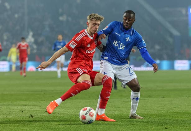 GER, Darmstadt, SV Darmstadt 98 vs 1 FC Nürnberg, 2 Bundesliga, Football, DFB, Season 2025 2026, Merck Stadion am Böllenfalltor, 19 Matchday in picture f l Finn Becker 1 FC Nürnberg 25 , Merveille Papela SV Darmstadt 98 21 DFB DFL REGULATIONS PROHIBIT ANY USE OF PHOTOGRAPHS AS IMAGE SEQUENCES AND OR QUASI VIDEO, 23 01 2026 Copyright: HMBxMedia HendrikxHamelau