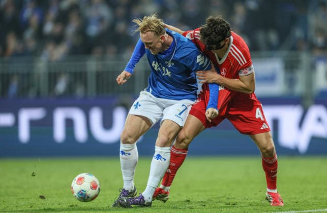GER, Darmstadt, SV Darmstadt 98 vs 1 FC Nürnberg, 2 Bundesliga, Football, DFB, Season 2025 2026, Merck Stadion am Böllenfalltor, 19 Matchday in picture f l Isac Lidberg SV Darmstadt 98 7 , Fabio Gruber 1 FC Nürnberg 4 DFB DFL REGULATIONS PROHIBIT ANY USE OF PHOTOGRAPHS AS IMAGE SEQUENCES AND OR QUASI VIDEO, 23 01 2026 Copyright: HMBxMedia HendrikxHamelau