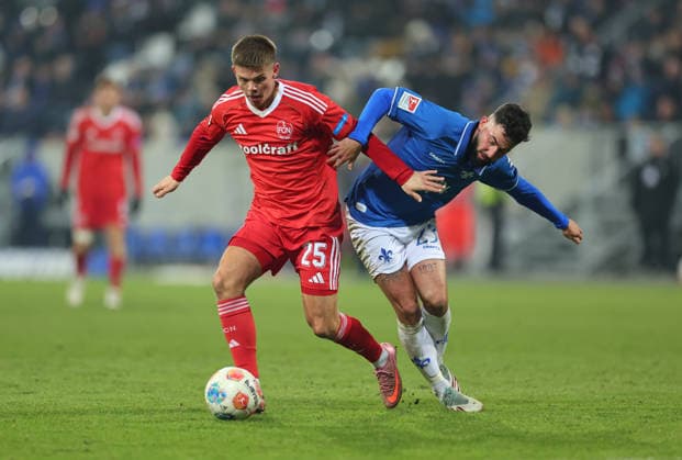 23 01 2026, Soccer 2 Bundesliga, SV Darmstadt 98 1 FC Nürnberg, emonline, emspor, despor, v l , Finn Becker 1 FC Nürnberg , Marco Richter SV Darmstadt 98 DFL DFB REGULATIONS PROHIBIT ANY USE OF PHOTOGRAPHS AS IMAGE SEQUENCES AND OR QUASI VIDEO xdcx Copyright: HMBxMedia Claus