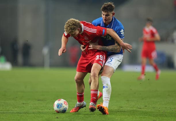 23 01 2026, Soccer 2 Bundesliga, SV Darmstadt 98 1 FC Nürnberg, emonline, emspor, despor, v l , Piet Scobel 1 FC Nürnberg , Matej Maglica SV Darmstadt 98 DFL DFB REGULATIONS PROHIBIT ANY USE OF PHOTOGRAPHS AS IMAGE SEQUENCES AND OR QUASI VIDEO xdcx Copyright: HMBxMedia Claus