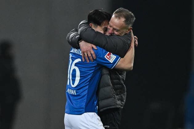 Hiroki Akiyama SV Darmstadt 1898, 16 and Darius Scholtysik SV Darmstadt 1898, Co Trainer embrace after the goal for 1 0 GER, SV Darmstadt 98 vs 1 FC Nürnberg, Football, 2 Bundesliga, Matchday 19, Season 2025 2026, 23 01 2026 DFL REGULATES PROHIBIT ANY USE OF PHOTOGRAPHS AS IMAGE SEQUENCES AND OR QUASI VIDEO GER, SV Darmstadt 98 vs 1 FC Nürnberg, Football, 2 Bundesliga, Matchday 19, Season 2025 2026, 23 01 2026 Darmstadt Copyright: xEibner-Pressefoto FlorianxWiegandx EP_FWD