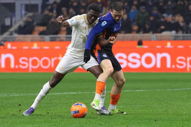 Milan, Italy, 23rd January 2026. Ebenezer Akinsanmiro of Pisa SC clashes with Piotr Zielinski of FC Internazionale in the penalty area during the Internazionale vs Pisa SC Serie A match at Giuseppe Meazza, Milan. Picture credit should read: Jonathan Moscrop Sportimage EDITORIAL USE ONLY. No use with unauthorised audio, video, data, fixture lists, club league logos or live services. Online in-match use limited to 120 images, no video emulation. No use in betting, games or single club league player publications. SPI_112_JM_INTER_PISA_ SPI-4419-0112