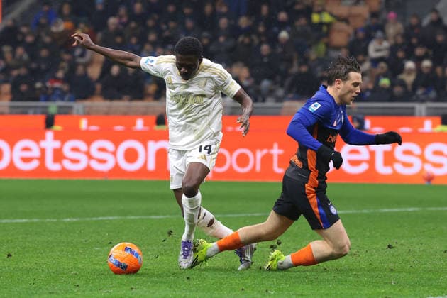 Milan, Italy, 23rd January 2026. Ebenezer Akinsanmiro of Pisa SC clashes with Piotr Zielinski of FC Internazionale in the penalty area during the Internazionale vs Pisa SC Serie A match at Giuseppe Meazza, Milan. Picture credit should read: Jonathan Moscrop Sportimage EDITORIAL USE ONLY. No use with unauthorised audio, video, data, fixture lists, club league logos or live services. Online in-match use limited to 120 images, no video emulation. No use in betting, games or single club league player publications. SPI_113_JM_INTER_PISA_ SPI-4419-0113