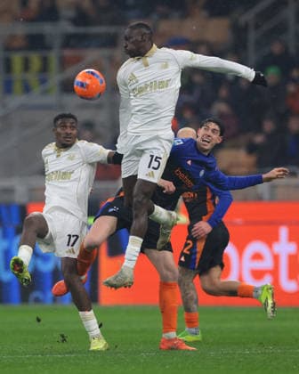 Milan, Italy, 23rd January 2026. Alessandro Bastoni of FC Internazionale clashes with Rafiu Adekunle Durosinmi and Idrissa Toure of Pisa SC during the Internazionale vs Pisa SC Serie A match at Giuseppe Meazza, Milan. Picture credit should read: Jonathan Moscrop Sportimage EDITORIAL USE ONLY. No use with unauthorised audio, video, data, fixture lists, club league logos or live services. Online in-match use limited to 120 images, no video emulation. No use in betting, games or single club league player publications. SPI_122_JM_INTER_PISA_ SPI-4419-0122