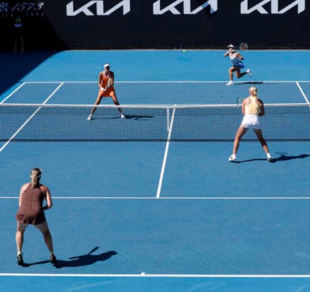 (260124) -- MELBOURNE, Jan. 24, 2026 -- Guo Hanyu (R, Top) Kristina Mladenovic compete during the women s doubles 2nd round match between Guo Hanyu (China) Kristina Mladenovic (France) and Clara Tauson (Denmark) Anastasia Pavlyuchenkova (Russia) at the Australian Open tennis tournament in Melbourne, Australia, Jan. 24, 2026. ) (SP) AUSTRALIA-MELBOURNE-TENNIS-AUSTRALIAN OPEN-WOMEN S DOUBLES MaxPing 