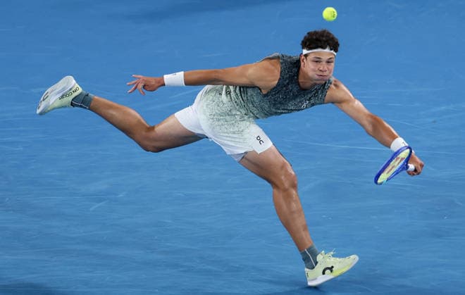 (260124) -- MELBOURNE, Jan. 24, 2026 -- Ben Shelton of the United States hits a return during the men s singles 3rd round match against Valentin Vacherot of Monaco at the Australian Open 2026 tennis tournament in Melbourne, Australia, Jan. 24, 2026. ) (SP)AUSTRALIA-MELBOURNE-TENNIS-AUSTRALIAN OPEN-MEN S SINGLES MaxPing 