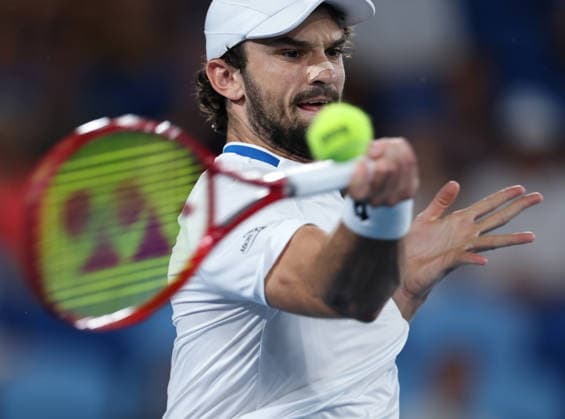 (260124) -- MELBOURNE, Jan. 24, 2026 -- Valentin Vacherot of Monaco hits a return during the men s singles 3rd round match against Ben Shelton of the United States at the Australian Open 2026 tennis tournament in Melbourne, Australia, Jan. 24, 2026. ) (SP)AUSTRALIA-MELBOURNE-TENNIS-AUSTRALIAN OPEN-MEN S SINGLES MaxPing 