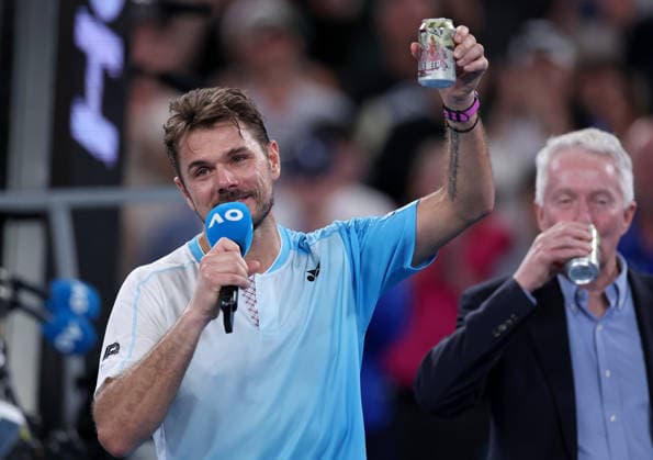 Stan Wawrinka stares a beer with Craig Tiley following his last ever match at the Australian Open Australian Open tennis tournament, Day Seven, Melbourne Park, Australia - 24 Jan 2026Melbourne Melbourne Park Victoria (VIC) Australia  Copyright: xEllaxLing Shutterstockx 16380459bh