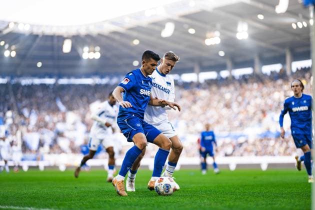 Marvin Wanitzek 10 Karlsruher SC in a duel with a Hertha BSC player Fighting for the ball Copyright: xspeedshotx