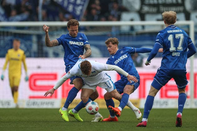 Gronning Sebastian Hertha BSC, 17 shields the ball in a duel against Marcel Franke Karlsruher SC, 28 Meiko Waeschenbach Karlsruher SC, 21 Leo Opitz Karlsruher SC, 17 , Karlsruher SC vs Hertha BSC, 2 Bundesliga, 19 Matchday, 2025 2026, 24 01 2026, DFL REGULATES PROHIBIT ANY USE OF PHOTOGRAPHS AS IMAGE SEQUENCES AND OR QUASI VIDEO, Karlsruher SC vs Hertha BSC, 2 Bundesliga, 19 Matchday, 2025 2026, 24 01 2026 Karlsruhe Copyright: xEibner-Pressefoto JanxPrihodax EP_JPA