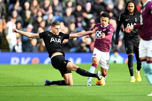 Marcus Edwards of Burnley is tackled by Micky van de Ven of Tottenham Hotspur Burnley v Tottenham Hotspur, Premier League, Football, Turf Moor, Burnley, UK - 24 Jan 2026Burnley Turf Moor United Kingdom EDITORIAL USE ONLY No use with unauthorised audio, video, data, fixture lists, club league logos or live services. Online in-match use limited to 120 images, no video emulation. No use in betting, games or single club league player publications.  Copyright: xAnnaxGowthorpe Shutterstockx 16425941w