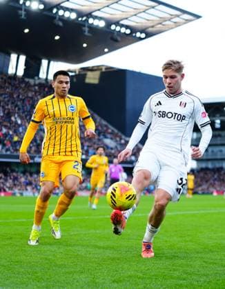 Emile Smith Rowe of Fulham holds off Diego Gomez of Brighton Fulham v Brighton and Hove Albion, Premier League, Football, Craven Cottage, London, UK - 24 Jan 2026London Craven Cottage United Kingdom EDITORIAL USE ONLY No use with unauthorised audio, video, data, fixture lists, club league logos or live services. Online in-match use limited to 120 images, no video emulation. No use in betting, games or single club league player publications.  Copyright: xJavierxGarcia Shutterstockx 16425974as