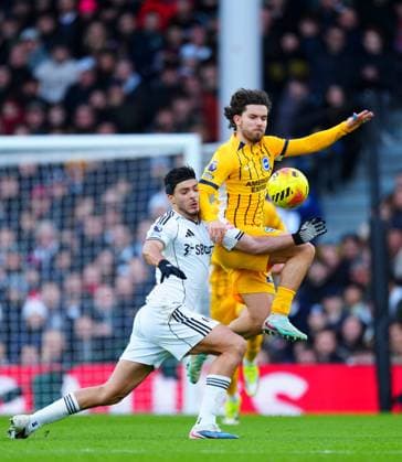 Ferdi Kadioglu of Brighton battles with Raul Jimenez of Fulham Fulham v Brighton and Hove Albion, Premier League, Football, Craven Cottage, London, UK - 24 Jan 2026London Craven Cottage United Kingdom EDITORIAL USE ONLY No use with unauthorised audio, video, data, fixture lists, club league logos or live services. Online in-match use limited to 120 images, no video emulation. No use in betting, games or single club league player publications.  Copyright: xJavierxGarcia Shutterstockx 16425974at
