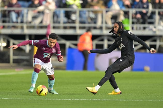 24th January 2026; Turf Moor, Burnley, Lancashire, England; Premier League Football, Burnley versus Tottenham Hotspur; Marcus Edwards of Burnley takes on Djed Spence of Tottenham Hotspur  LeexDurkin Content restricted for UK based newspaper
