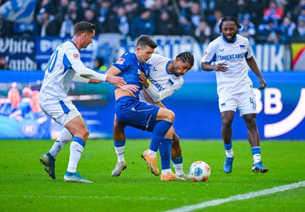 Marvin Wanitzek Karlsruher SC on the ball against Jeremy Dudziak Hertha BSC and Paul Seguin Hertha BSC during the 2 Bundesliga match between Karlsruher SC and Hertha BSC at BBBank Wildpark on January 24, 2026 in Karlsruhe, Germany, Germany Photo by Silas Schüller DeFodi Images Marvin Wanitzek Karlsruher SC controls the ball against Jeremy Dudziak Hertha BSC and Paul Seguin Hertha BSC during the 2 Bundesliga match between Karlsruher SC and Hertha BSC at BBBank Wildpark on January 24, 2026 in Karlsruhe, Germany Photo by Silas Schüller DeFodi Images DFB DFL REGULATIONS PROHIBIT ANY USE OF PHOTOGRAPHS AS IMAGE SEQUENCES AND OR QUASI VIDEO Photo by Silas Schueller DeFodi Images