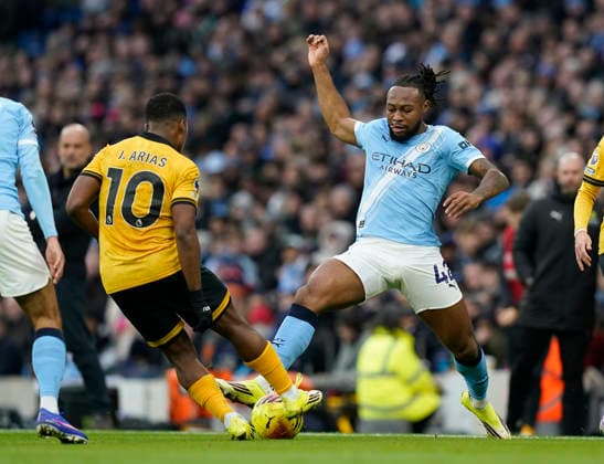 Manchester, England, 24th January 2026. Antoine Semenyo of Manchester City (R) is challenged by Jhon Arias of Wolverhampton Wanderers during the Manchester City vs Wolverhampton Wanderers Premier League match at the Etihad Stadium, Manchester. Picture credit should read: Andrew Yates Sportimage EDITORIAL USE ONLY. No use with unauthorised audio, video, data, fixture lists, club league logos or live services. Online in-match use limited to 120 images, no video emulation. No use in betting, games or single club league player publications. SPI_016_AY_MAN_CITY_WOLVES SPI-4473-0016