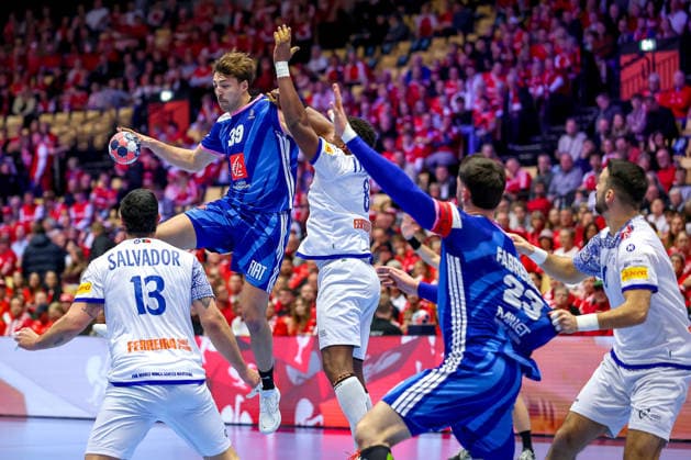 24 01 2026, Handball, Men s EHF EURO 2026, France Portugal, Jyske Bank Boxing in Herning, Denmark, Main Round Thibaud Briet France 39 in a duel against Victor Manuel Iturriza Alvarez Portugal 08 Rocha Nogueira Portugal 13 Denmark