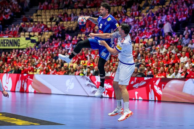 24 01 2026, Handball, Men s EHF EURO 2026, France Portugal, Jyske Bank Boxing in Herning, Denmark, Main Round Elohim Prandi France 08 in duel against Rocha Nogueira Portugal 13 Denmark